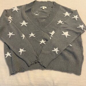 Cozy Gray and White V-Neck Sweater with Star Pattern
